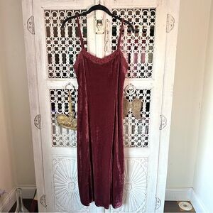 Burgundy velvet slip dress with lace trim and adjustable straps